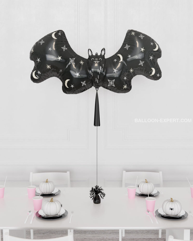 Black Bat Supershape Balloon with Tassel, inflated with helium